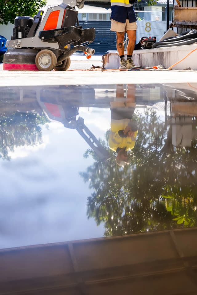 High-gloss polished concrete floor showcasing the finished result after grinding and polishing