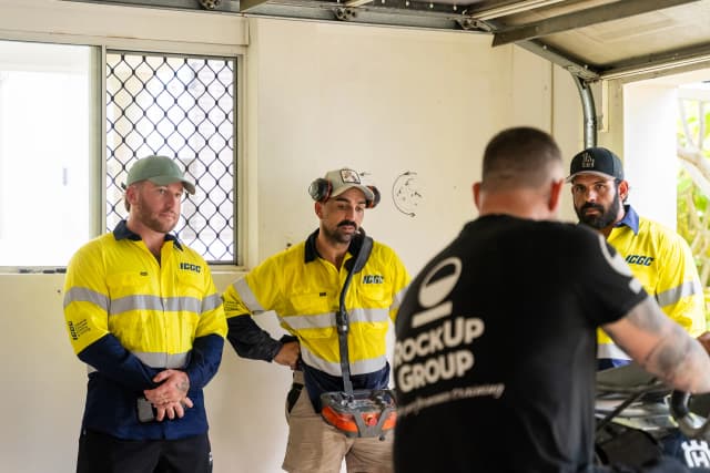 ICGC team members working with Husqvarna equipment during training day
